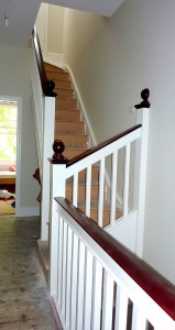 This bespoke staircase and handrail were a faithfull reproduction of the Edwardian original (foreground), to access a new loft conversion.
